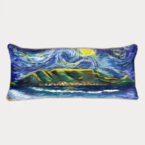 Rectangular luxury cushion featuring a vibrant, impressionistic painting of Table Mountain under a swirling night sky with ocean waves in the foreground.